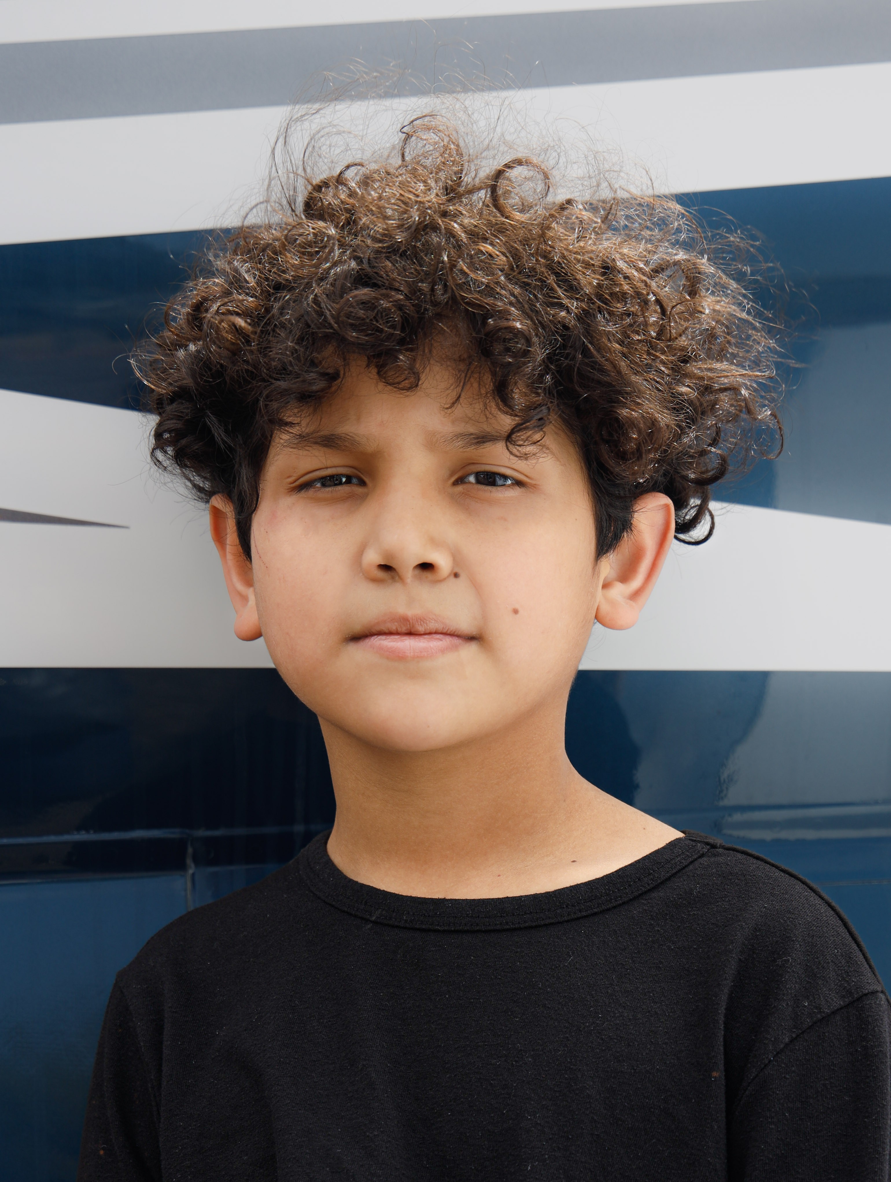 Adan standing headshot