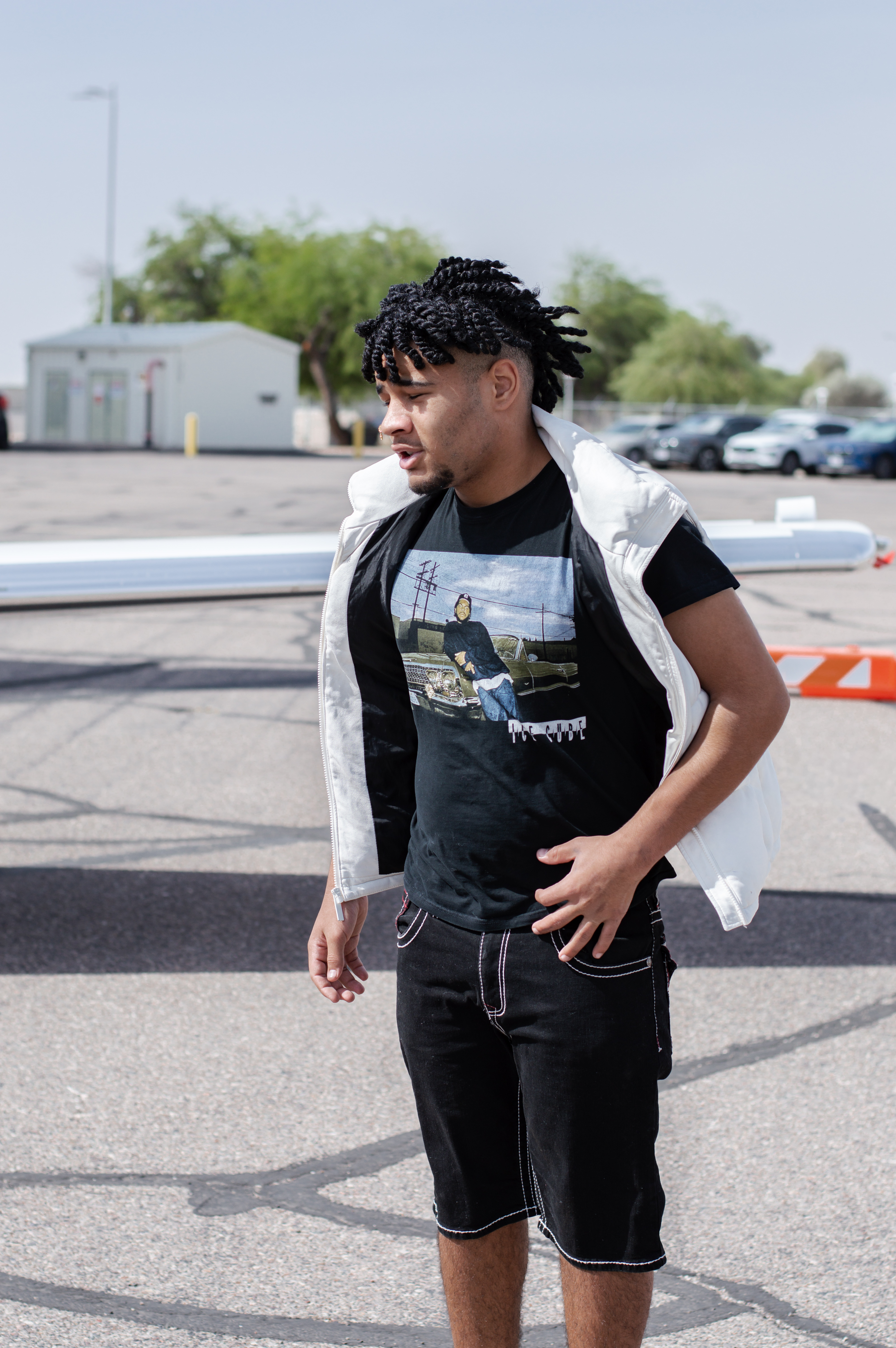 Matthias standing next to wing of plane