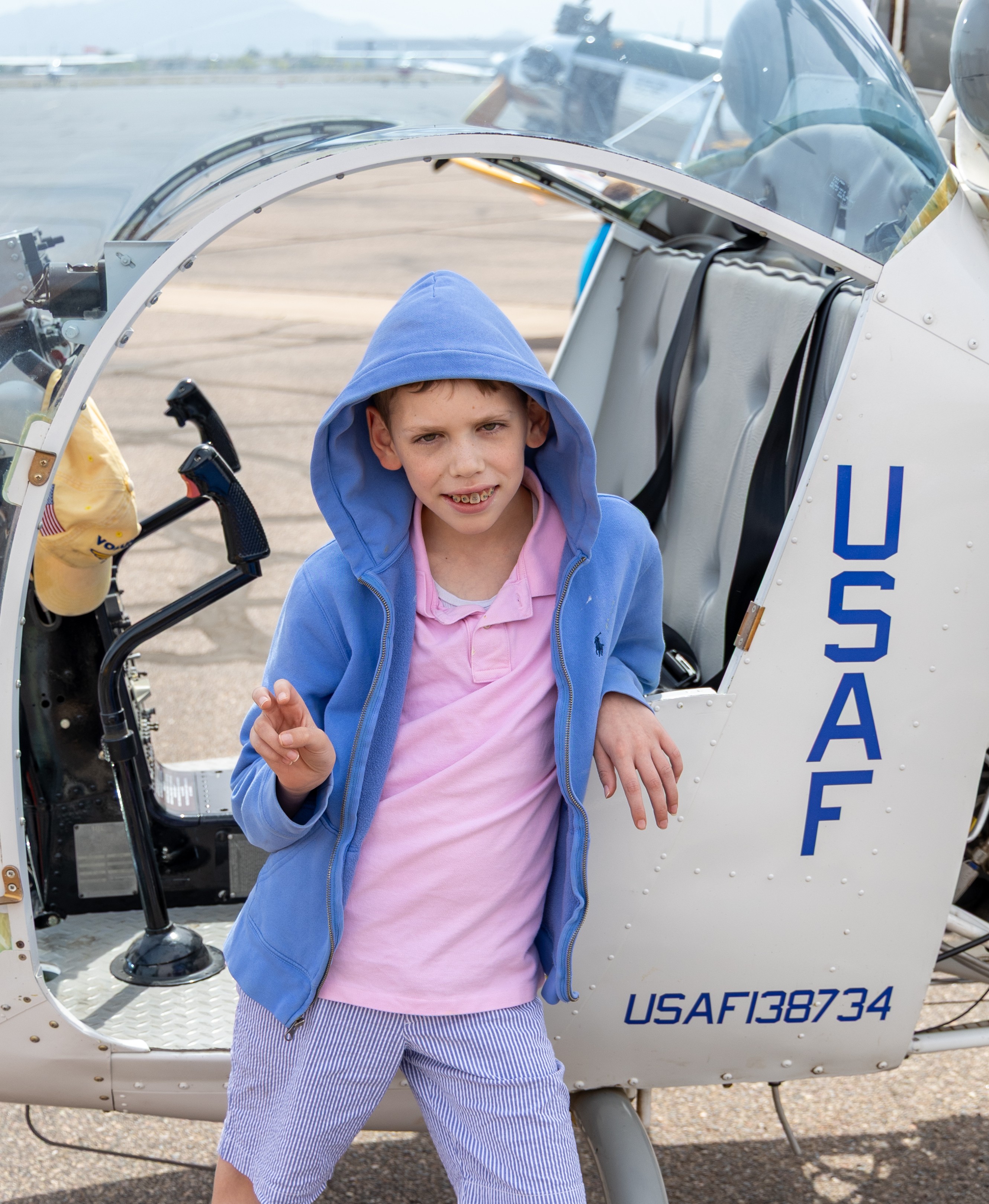 Tauke peace sign by helicopter