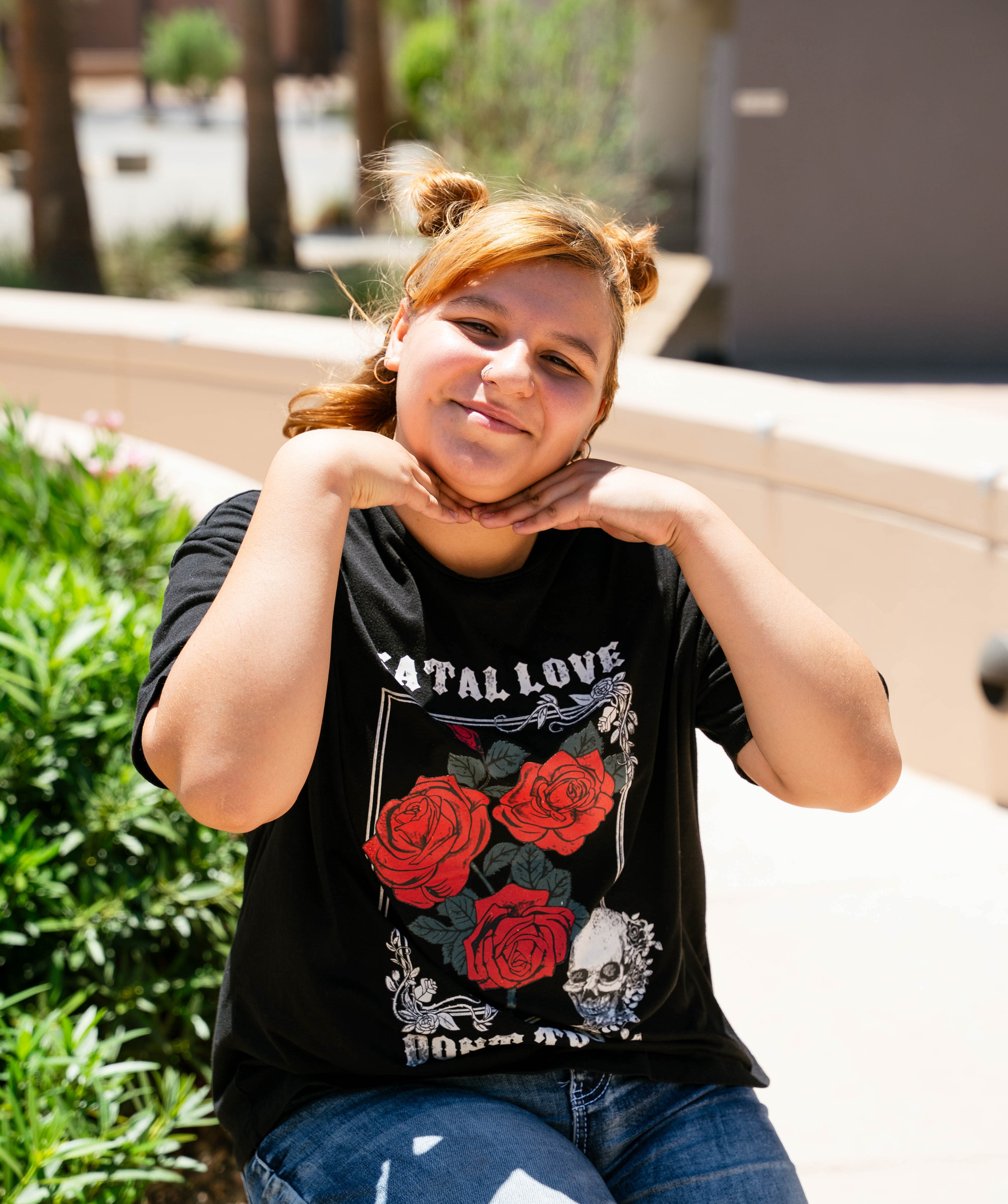 Valeria with hands to face