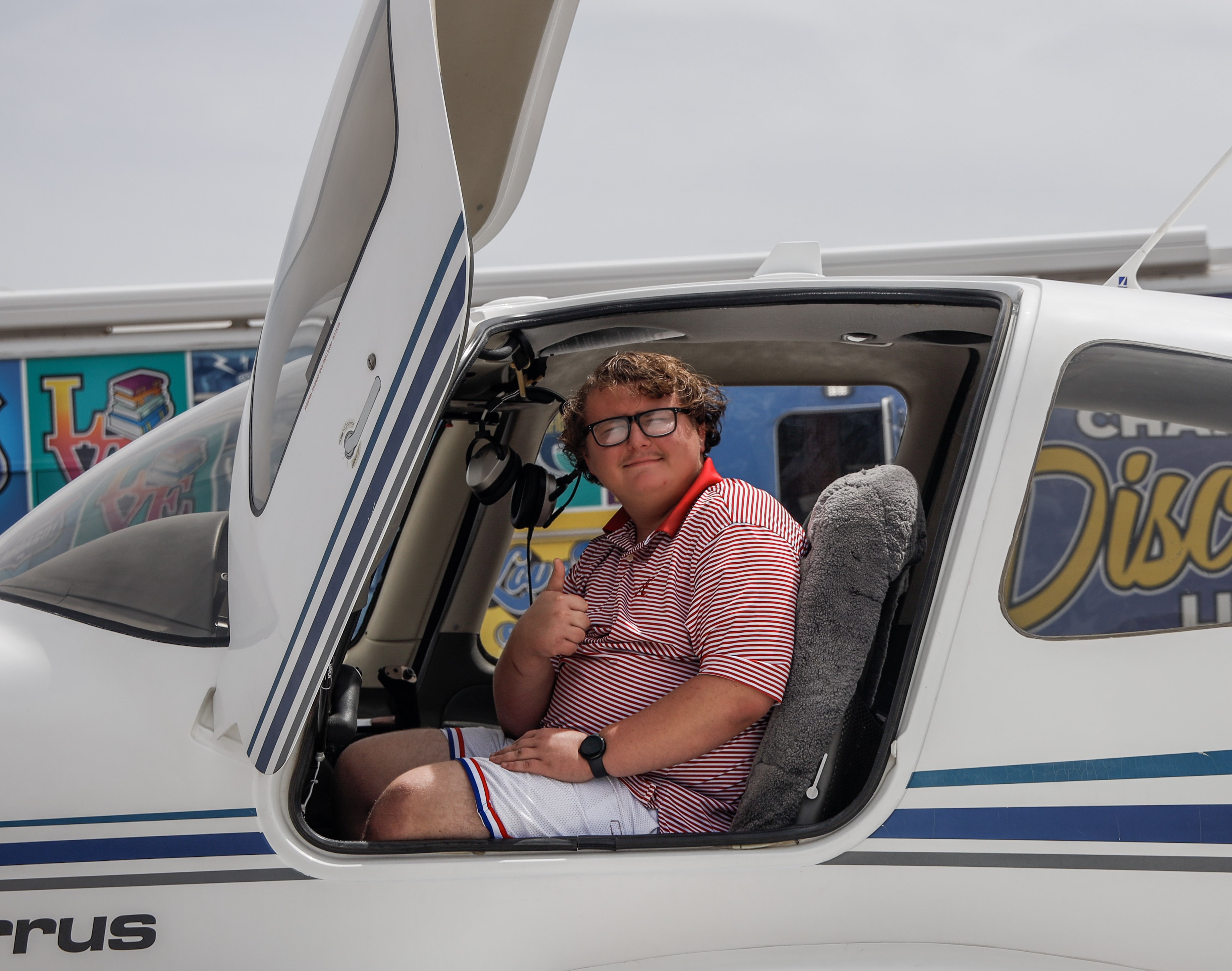 Zach sitting in plane