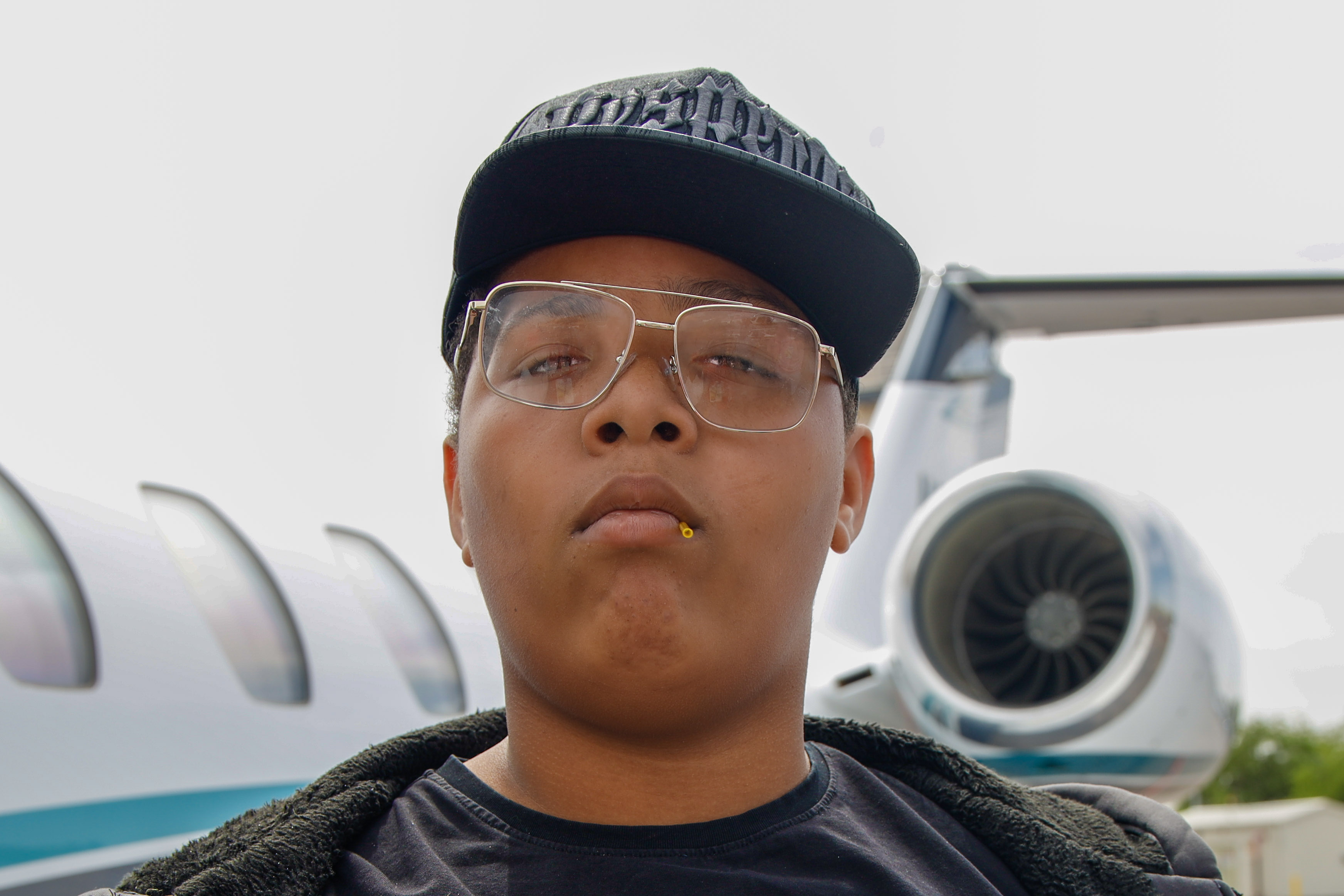 Joshua (1) with jet behind him
