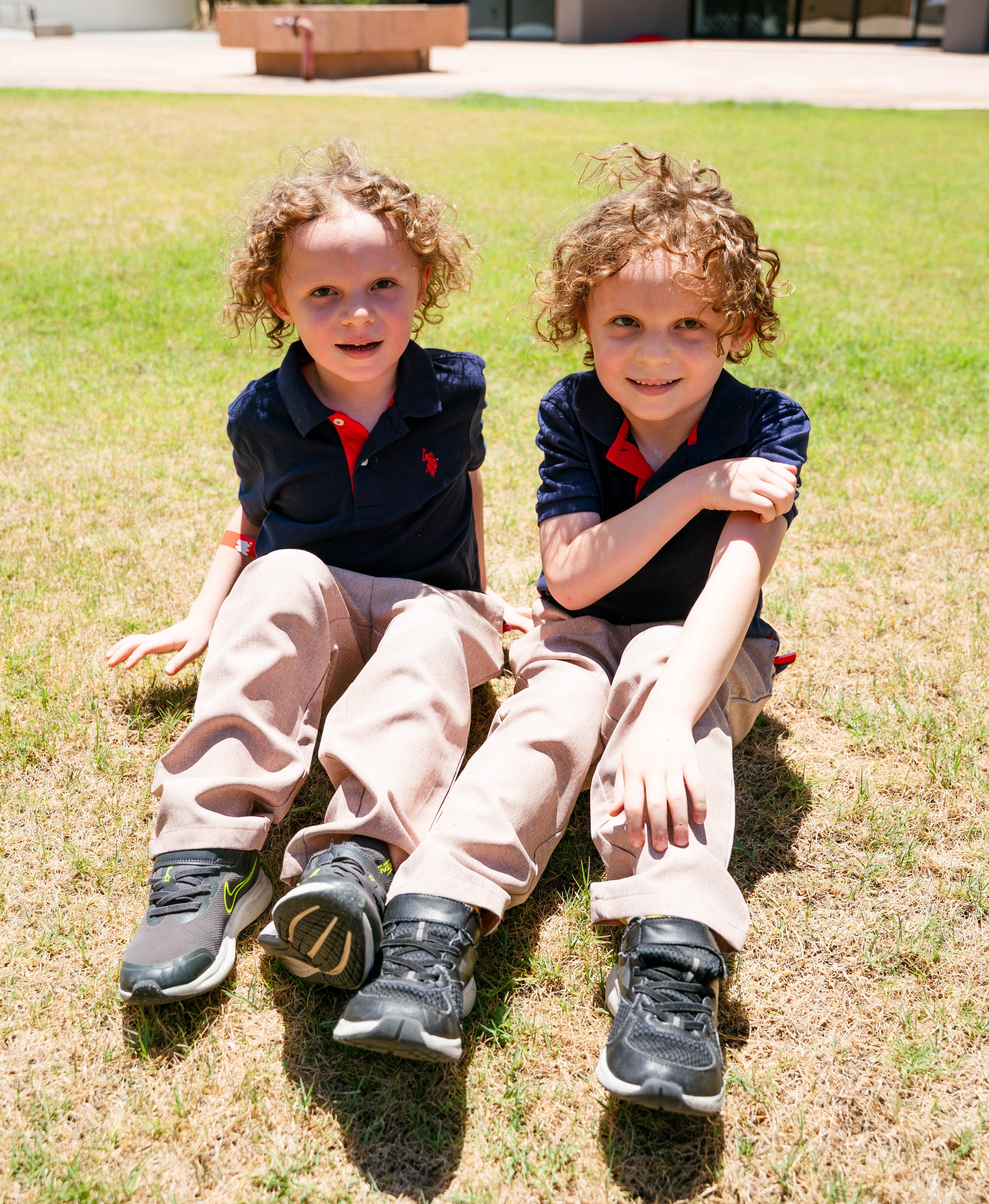 Kash and Curt sitting in grass