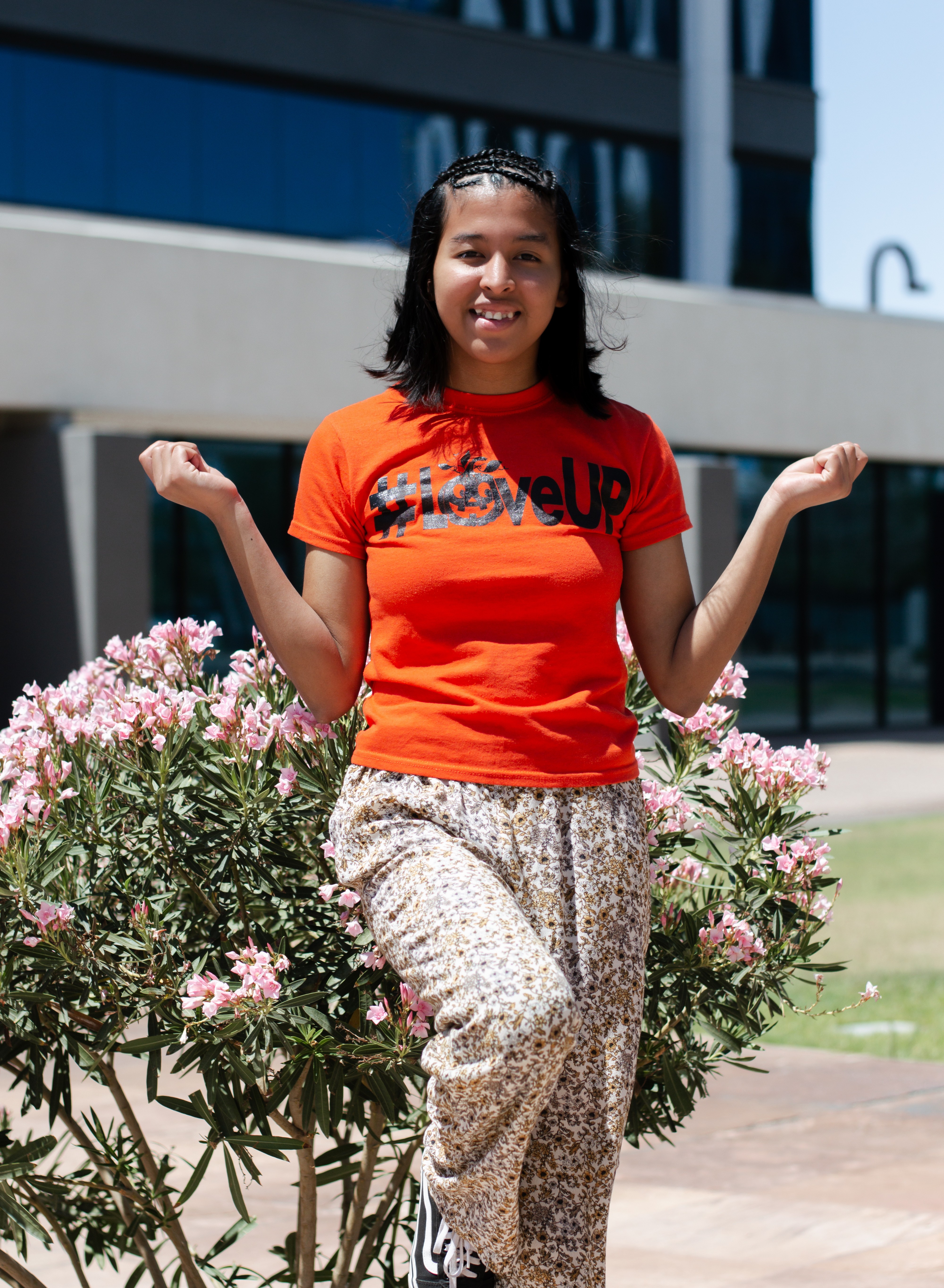 Lizbeth posing with one leg up