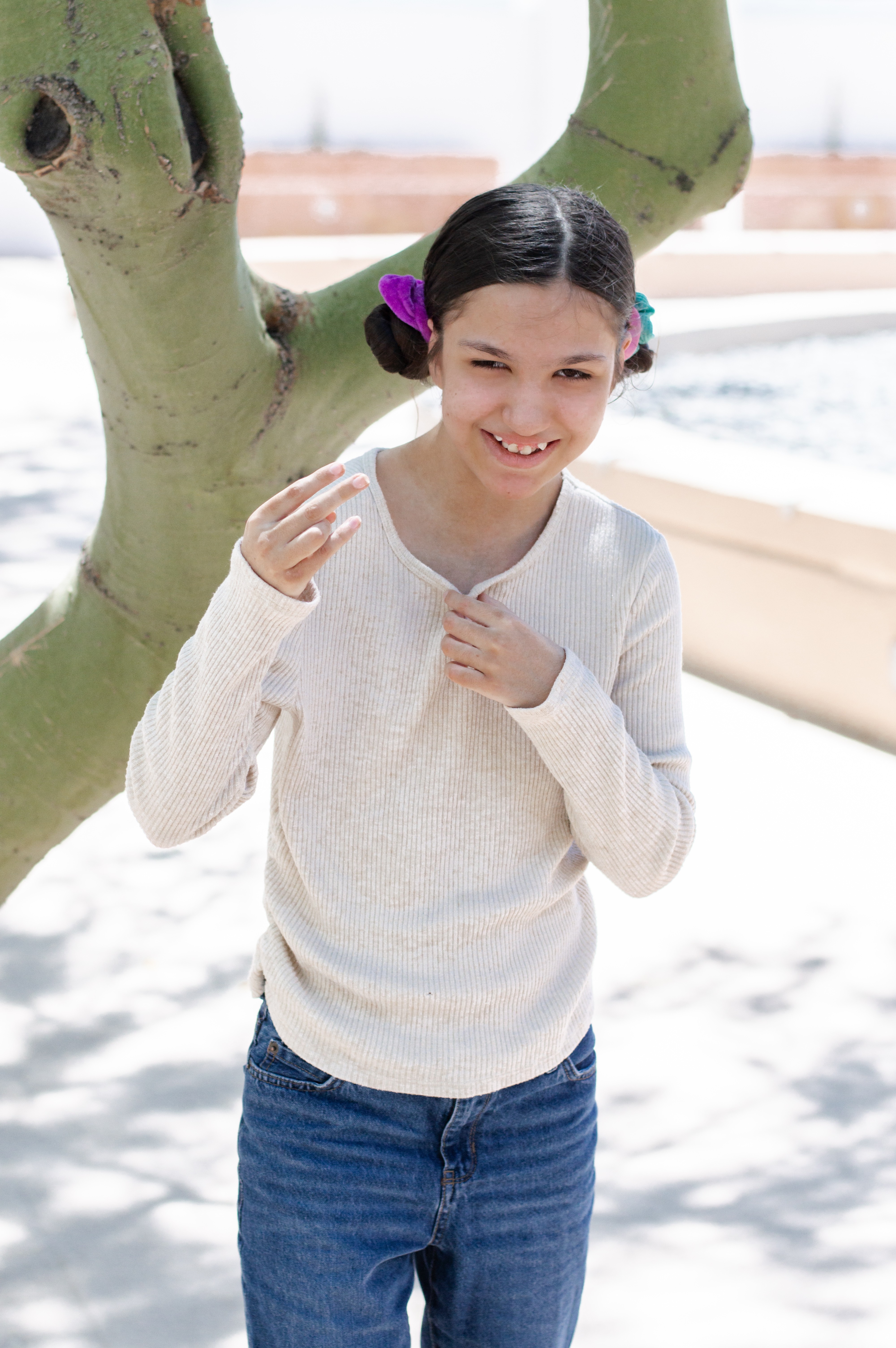 miranda standing near tree