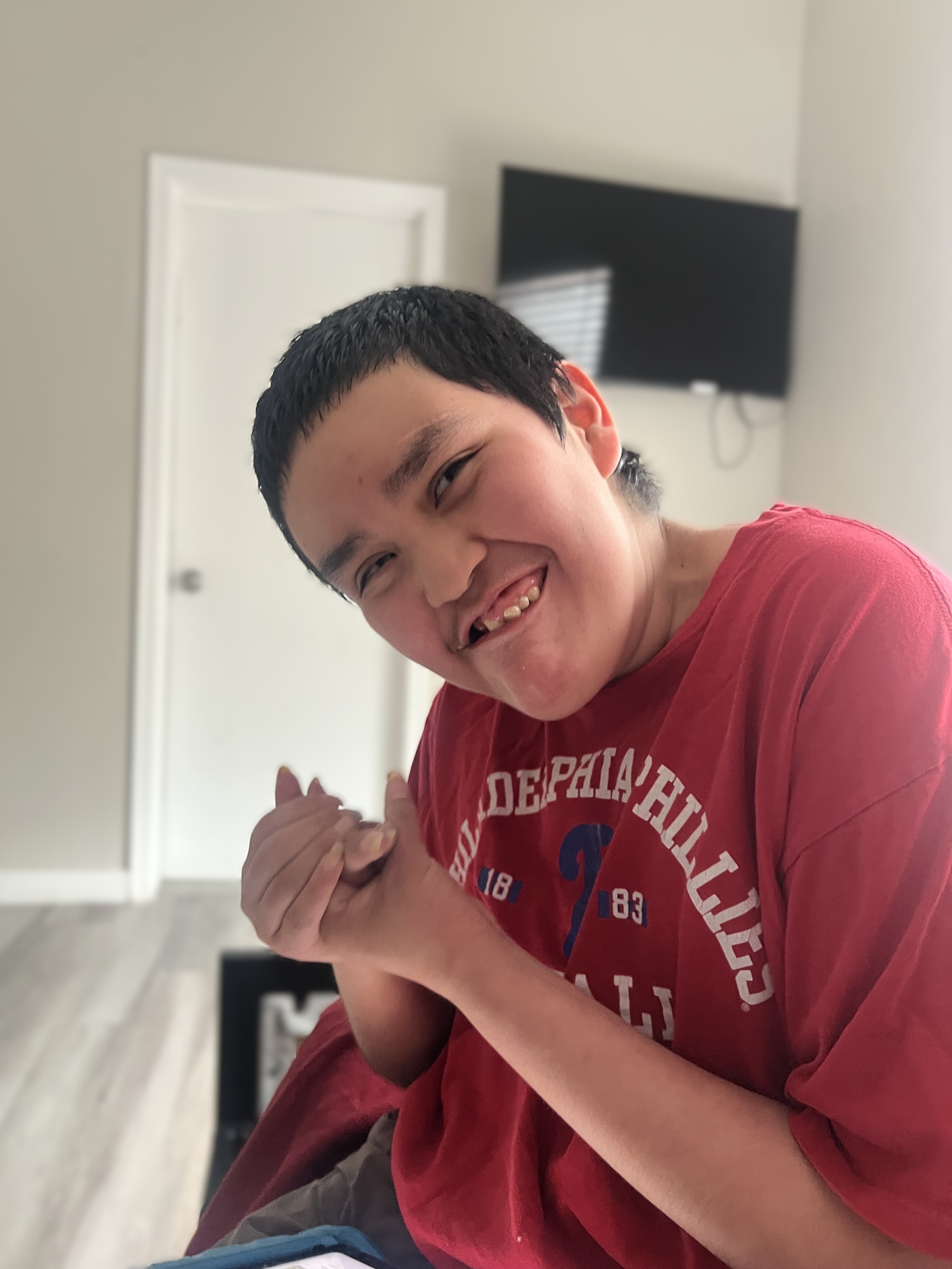 Travis smiling