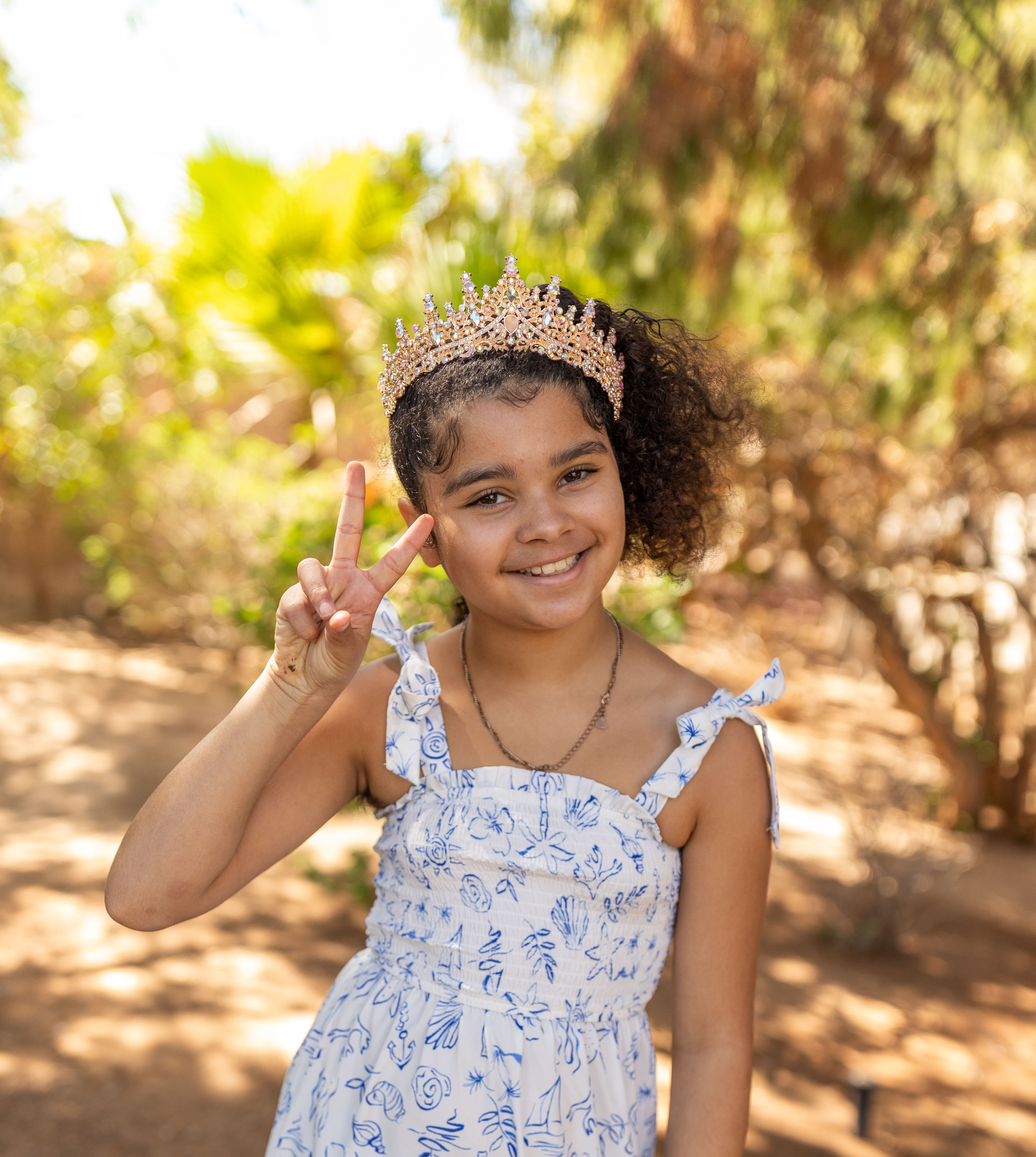 Adaleya with trees in background