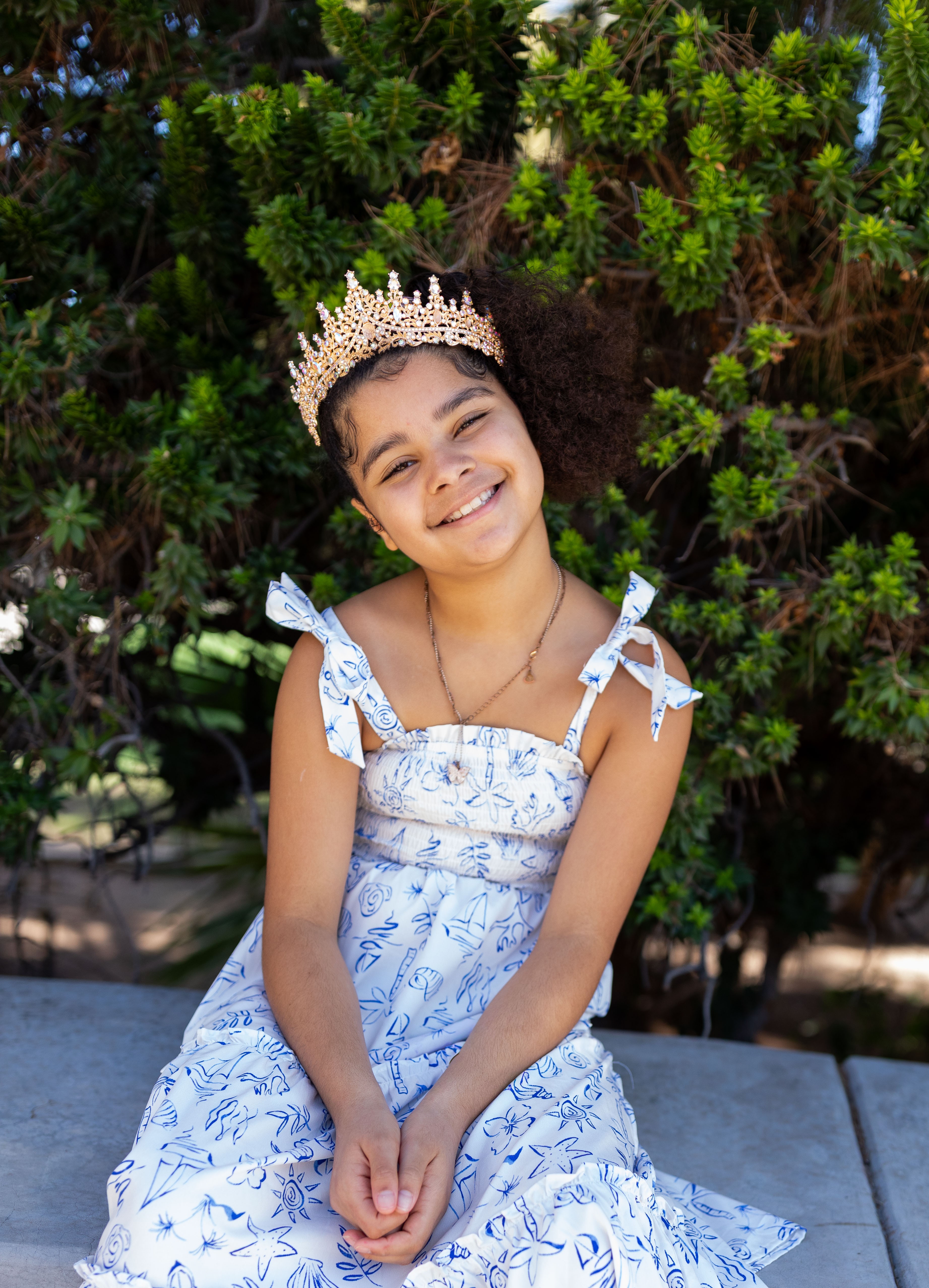 Adaleya sitting smiling
