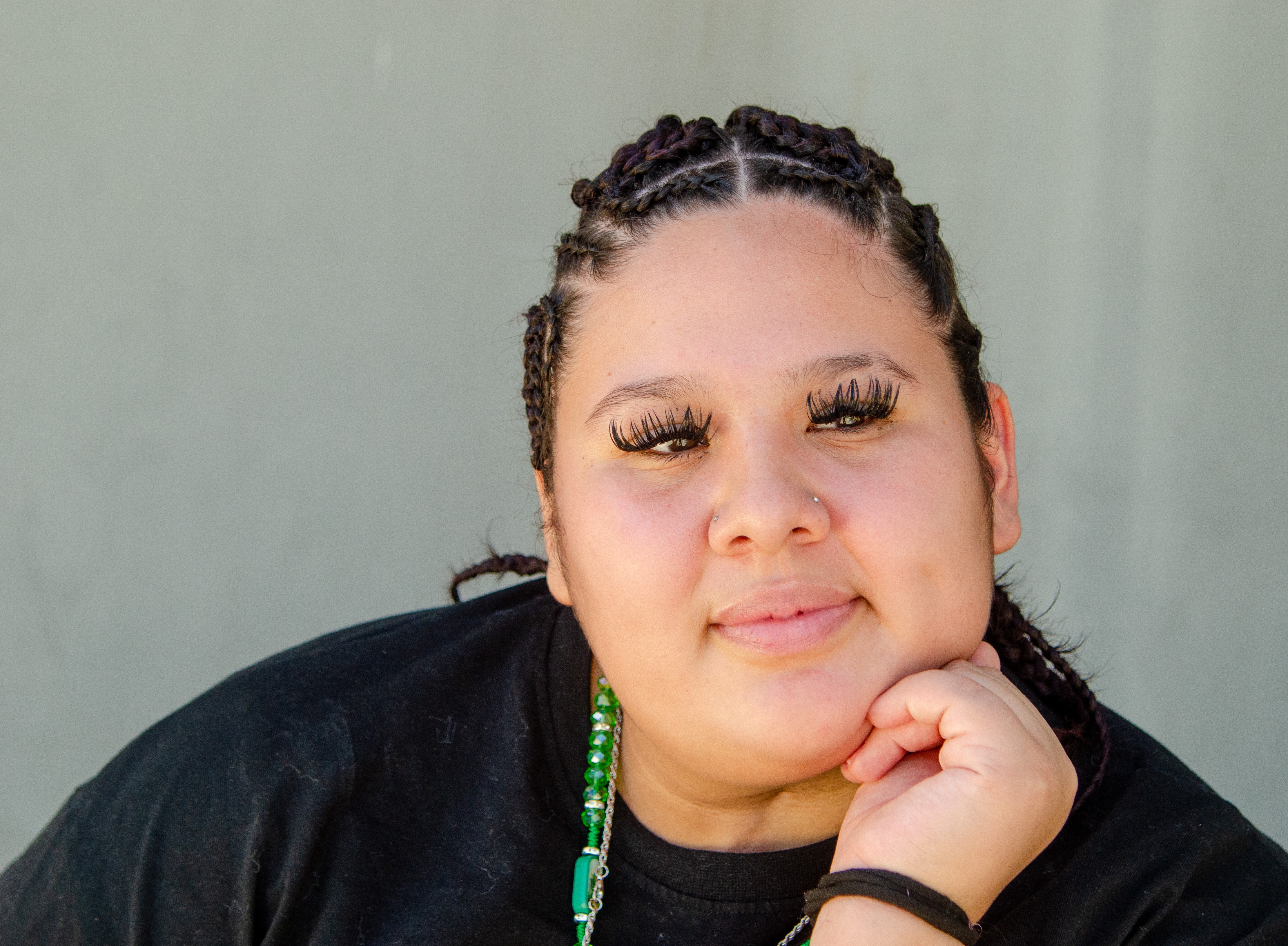 Adianna with hand on chin