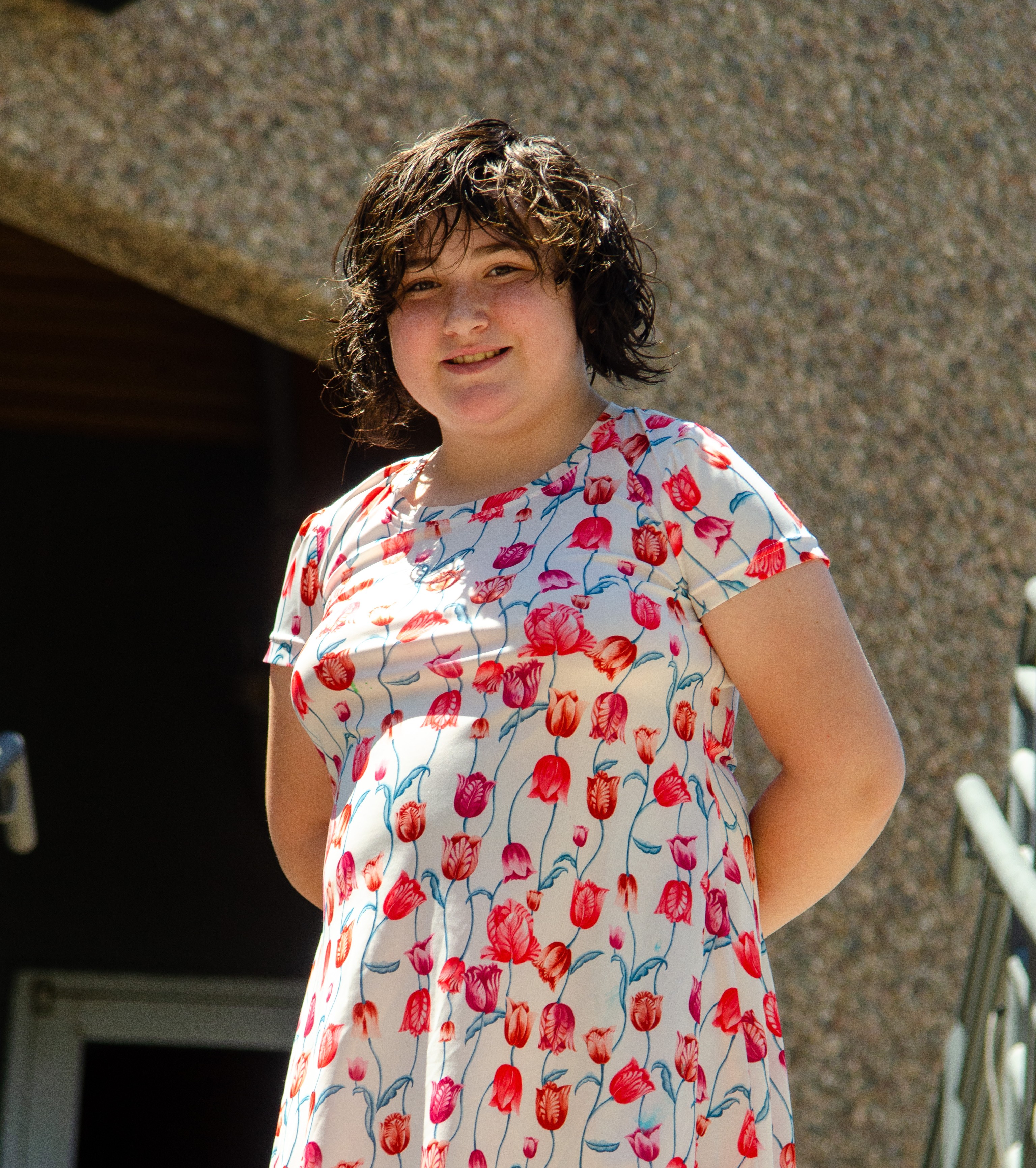 Amber standing smiling