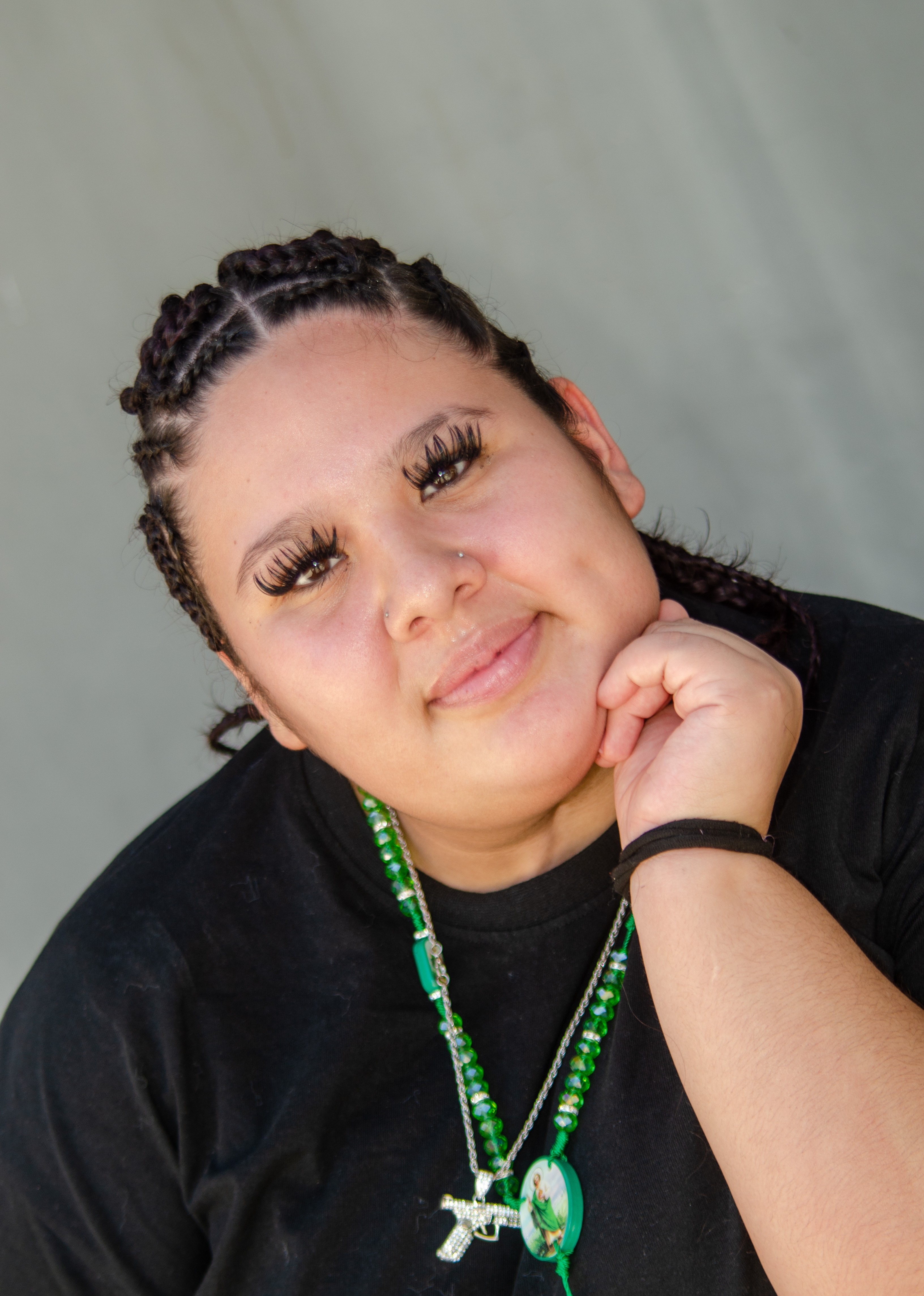 Adianna with hand on chin