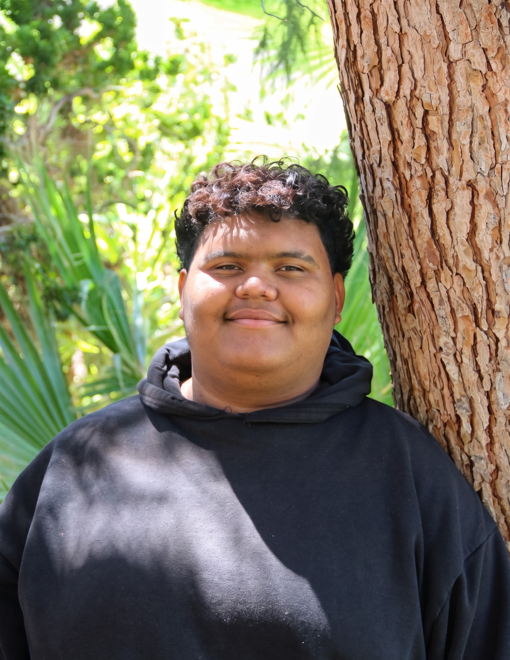 Brayan with tree in background