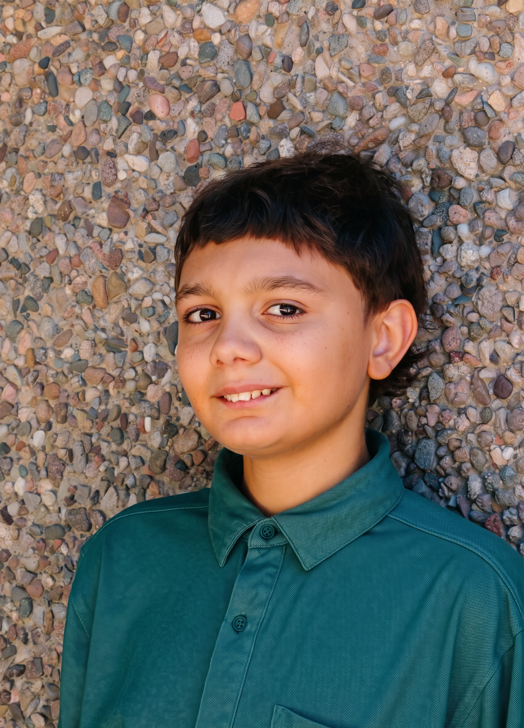 Ethen with rock wall in background