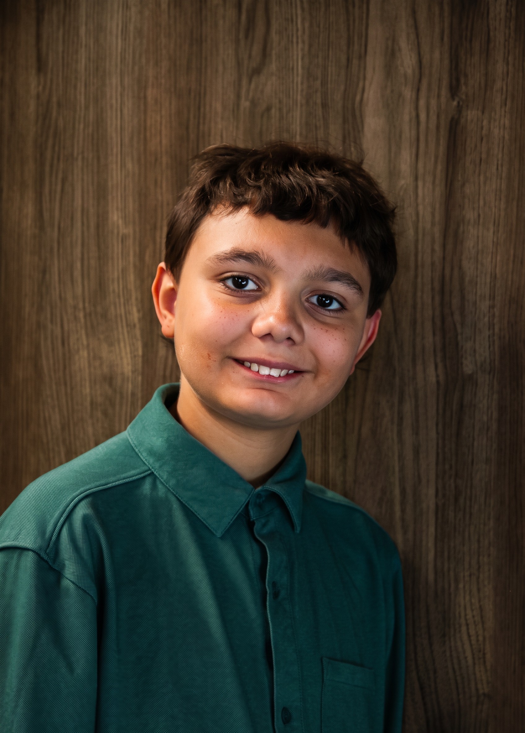 Ethen with wall in background