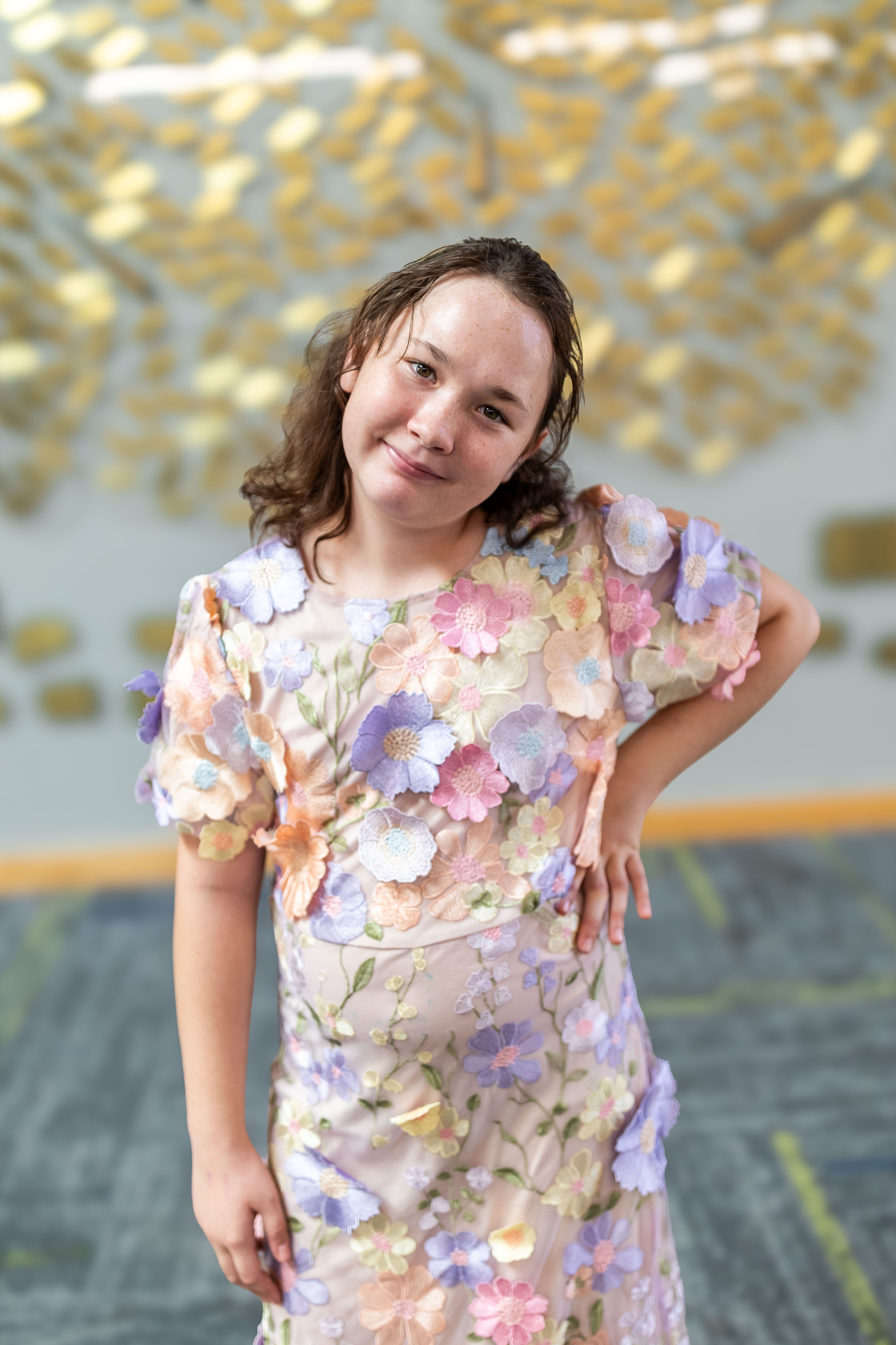 Grace standing with hand on hip 