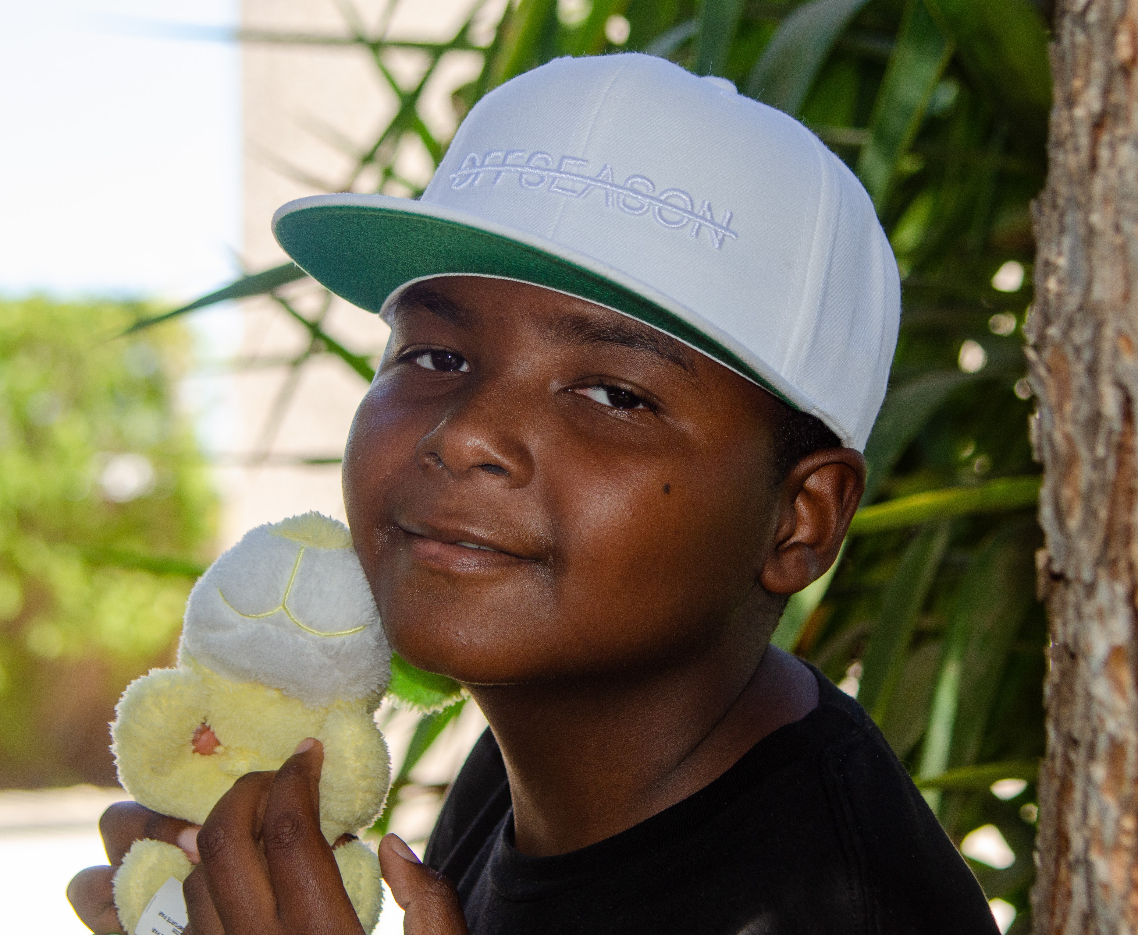 Latrell with stuffed animal