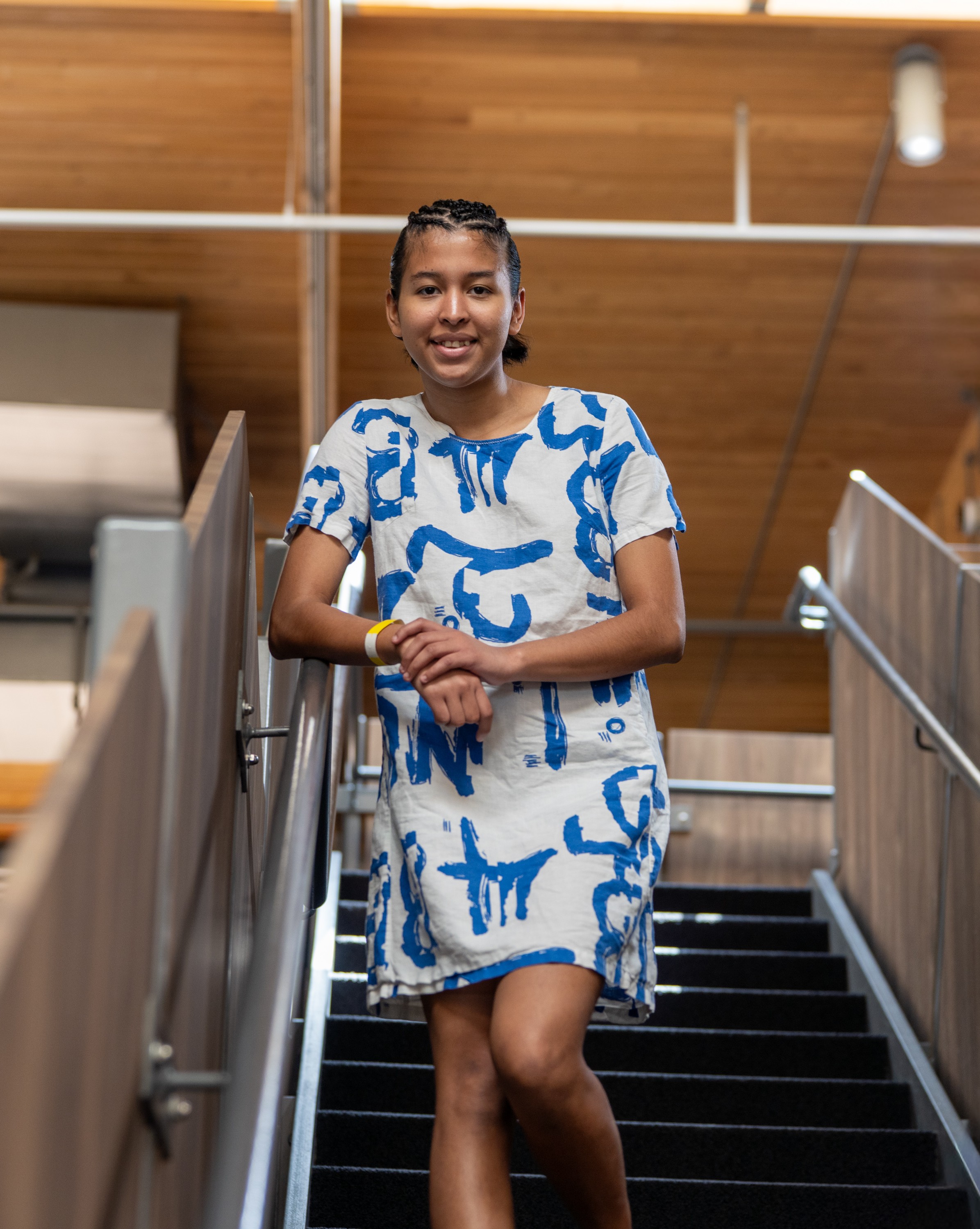 Lizbeth standing on stairs