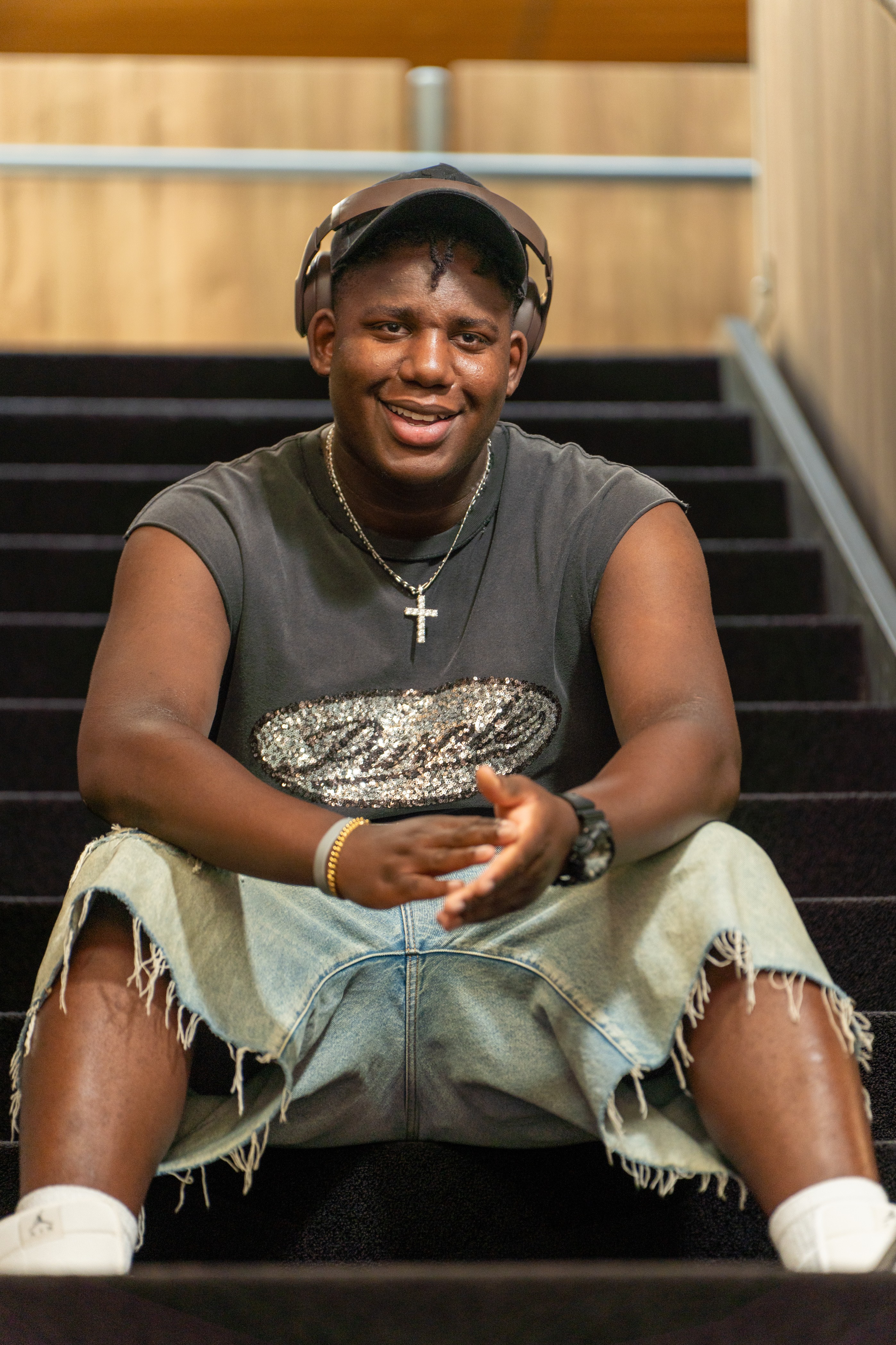 Chauncey sitting on stairs