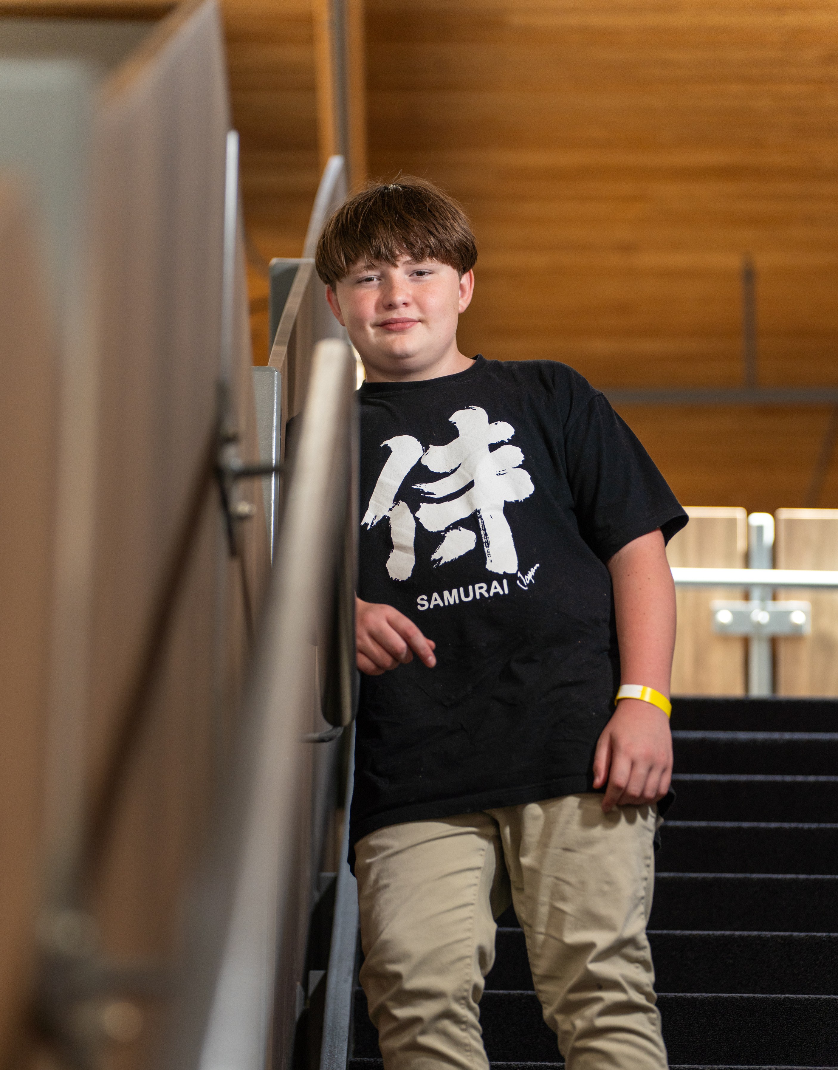 Jaxon standing on stairs
