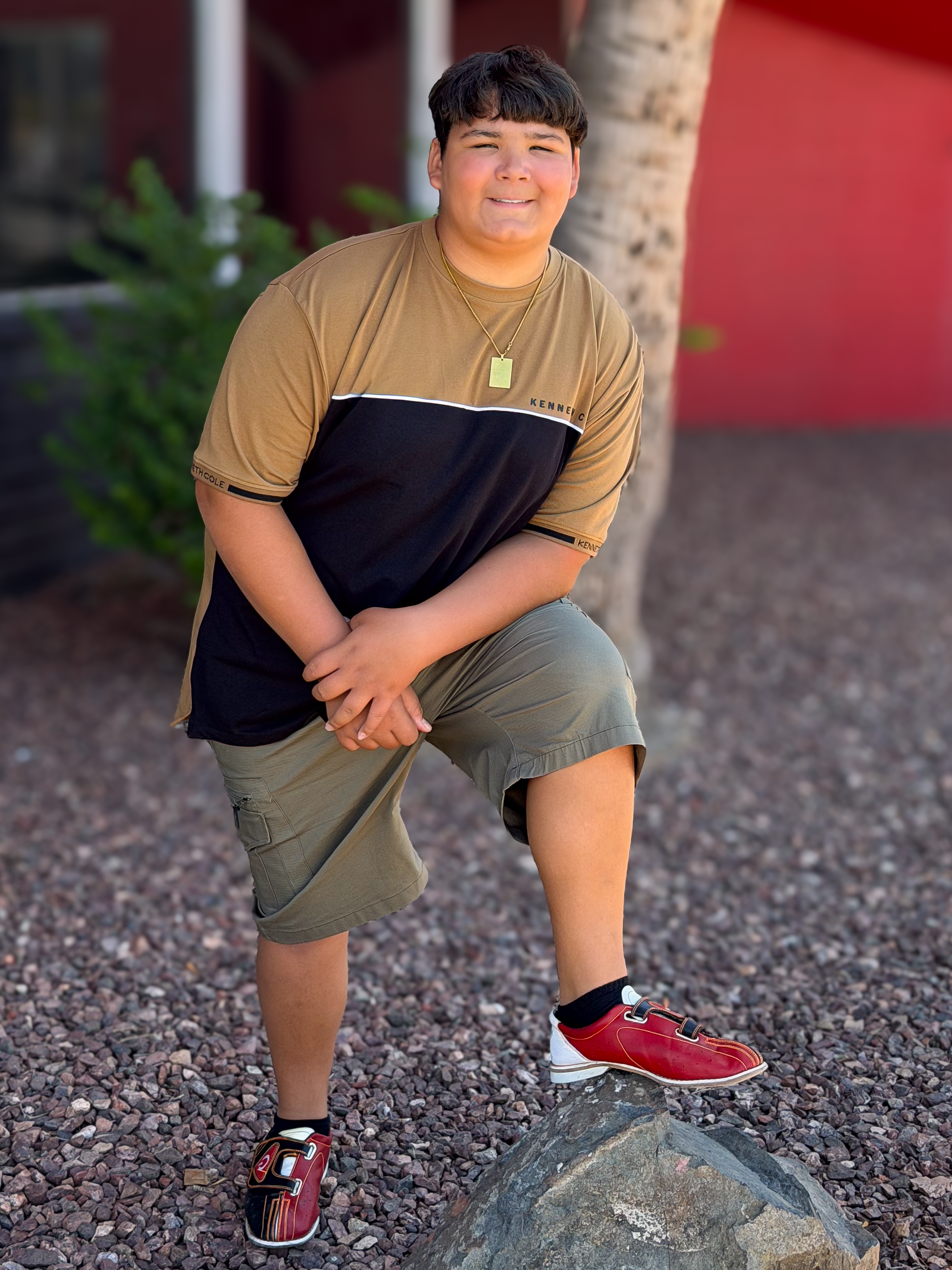 Jayden with foot on rock