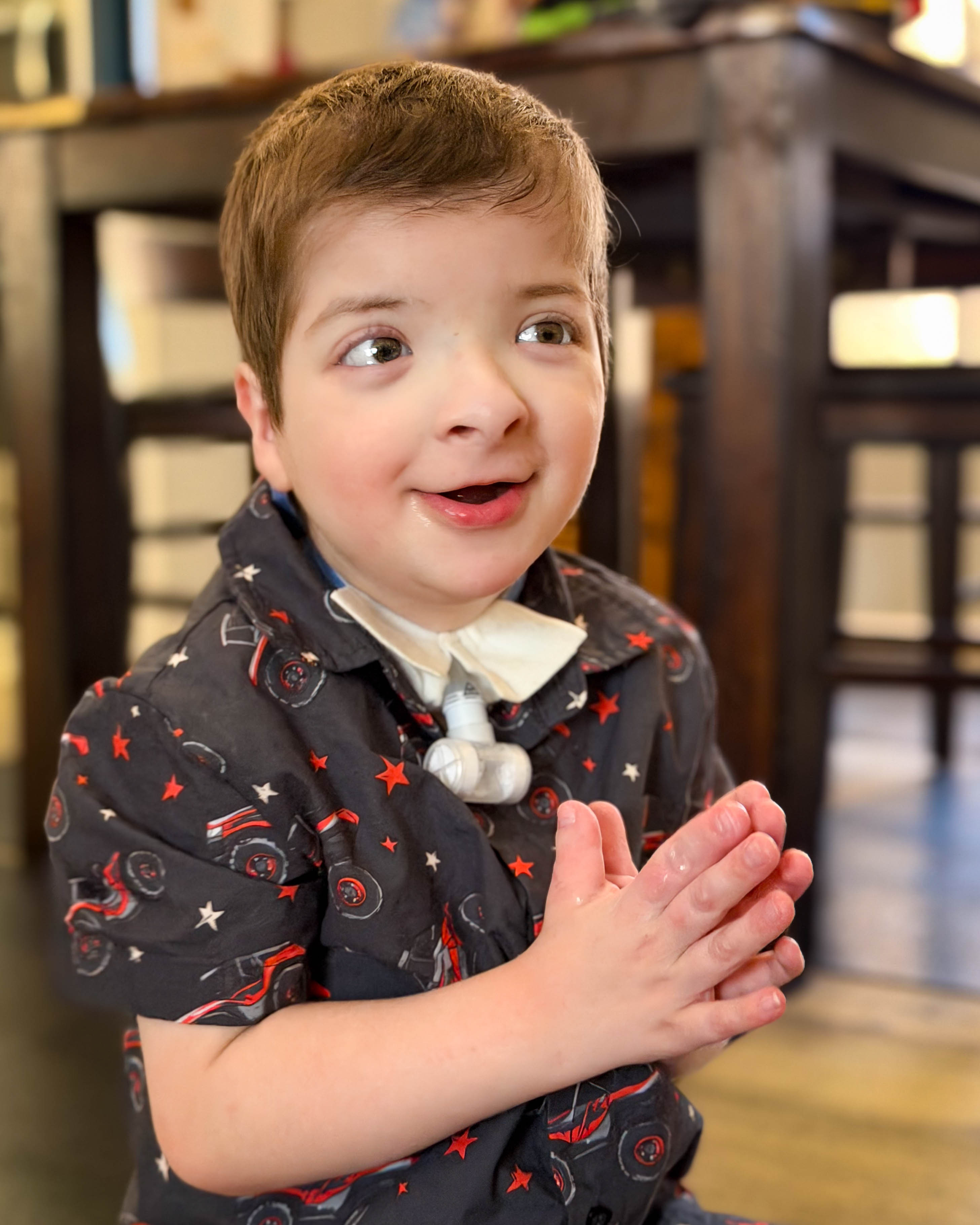 Kayson with hands together
