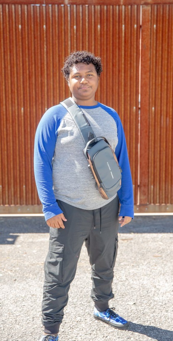 Xavier (1) Standing with brown gate in background