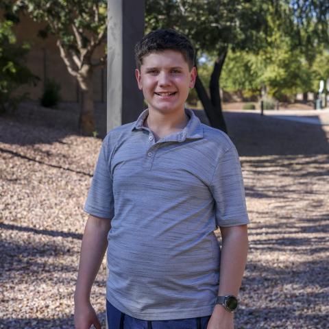 William standing smiling