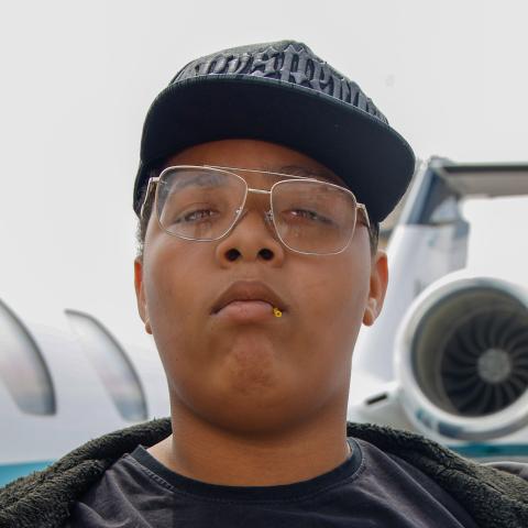 Joshua (1) with jet behind him