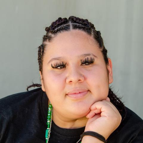Adianna with hand on chin