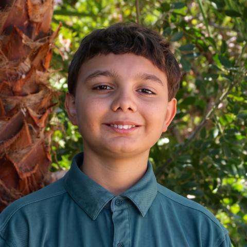 Ethen with tree in background