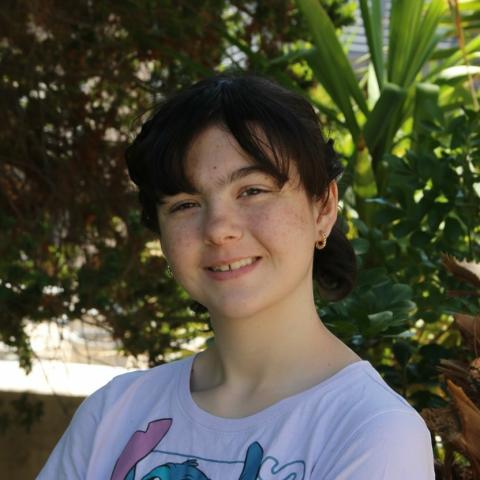 Isabella under a tree