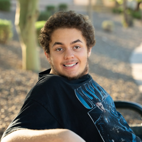 Jamarcus sitting on bench
